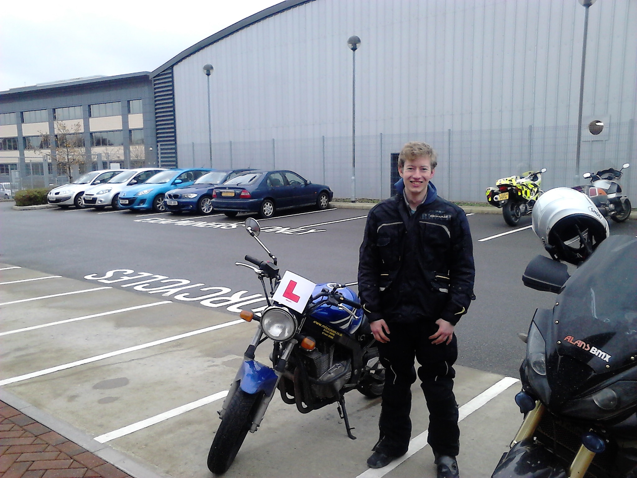 Josh with the Suzuki GS500 A2 motorbike