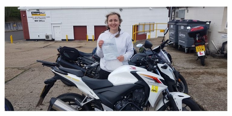 Lady biker passes A2